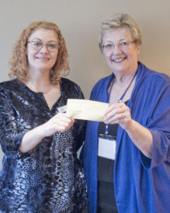 TCSRA donates to the Lacey Museum's building fund every year. At left, Erin Quinn Valcho received a check from Karen Keller.